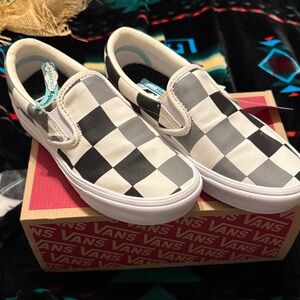 Vans Black and White Checkered Slip-Ons